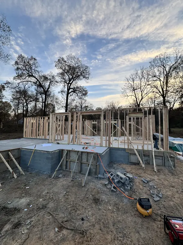 Framed walls at sunset