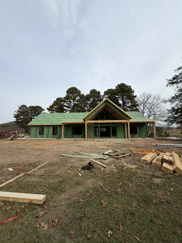 Front elevation with steep gable porch