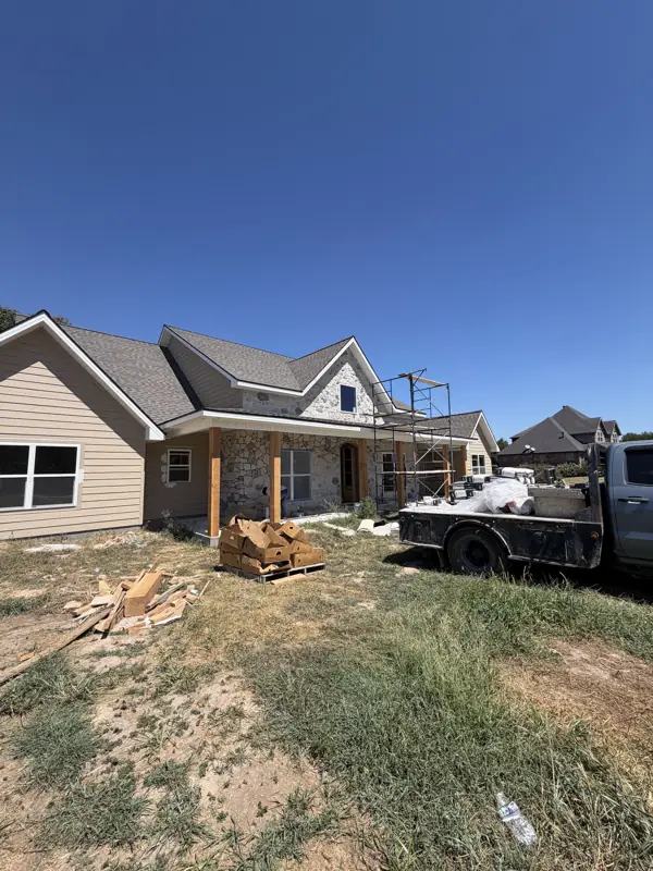 Side elevation with stone and siding